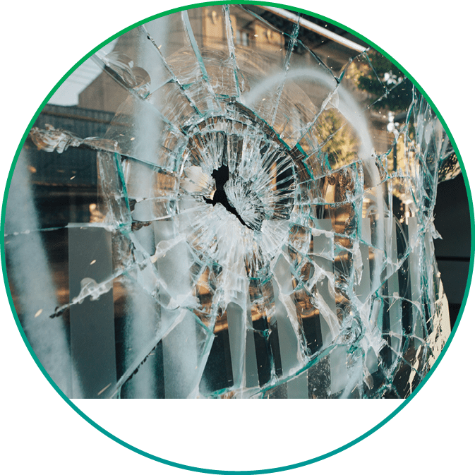 Shop window broken by riots in Chile